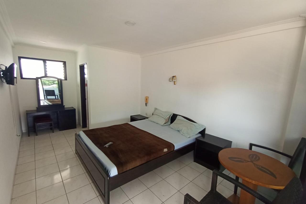 Oyo 92324 Hotel Sinar Rejeki 苏加武眉 外观 照片
